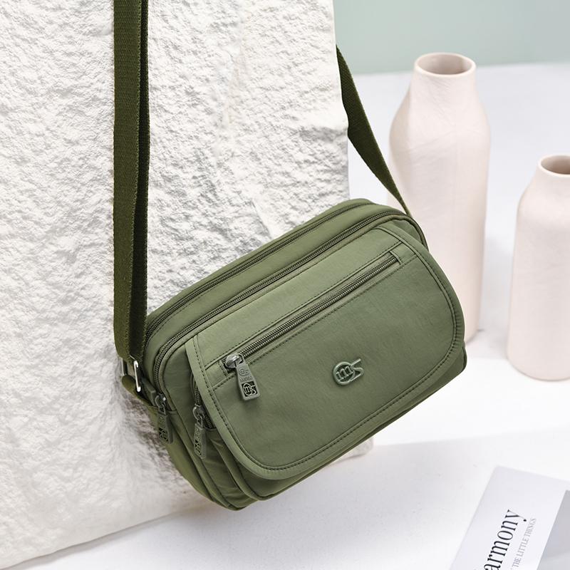 Kompaktní crossbody taška s více kapsami na zip pro muže a ženy