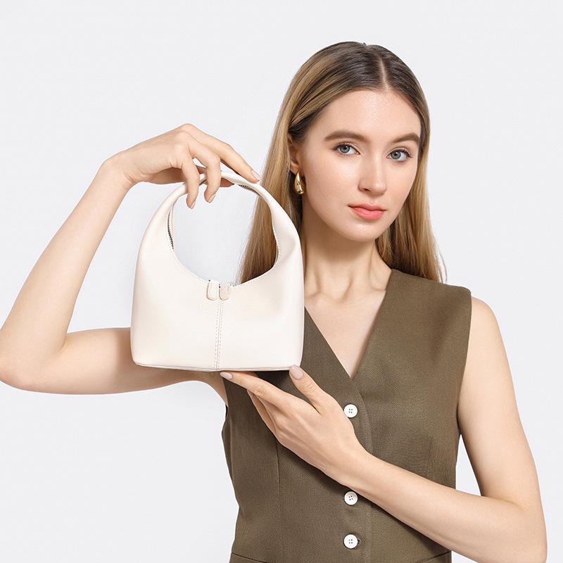 

Women s Bag Features A Solid Color Design, Exuding A Sense of High-end Elegance, Freshness, Fashion, and Retro Style. It Is A Versatile Handbag білий