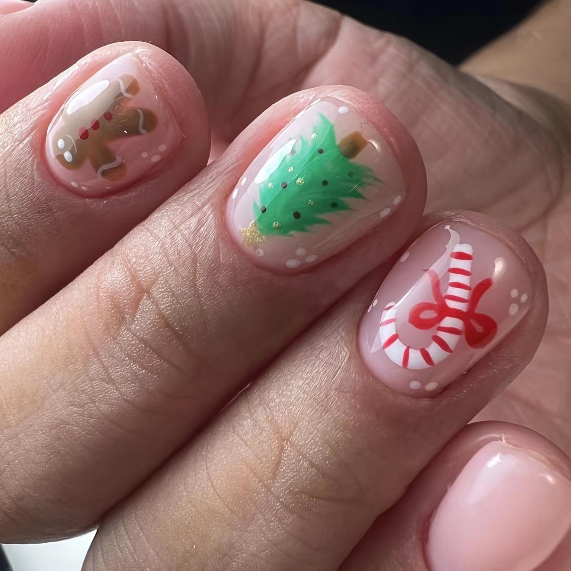 

Glossy Christmas Snowman & Candy Cane Press-On Nails with Tree & Snowflake Nail Art.
