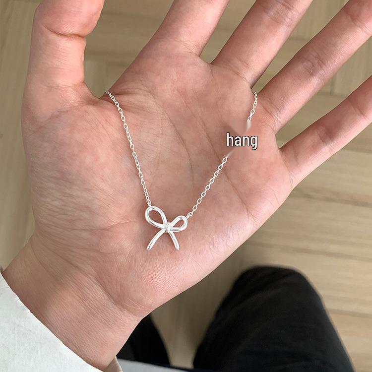 

2025 Twin Bow Necklace: Japanese & Korean Simple Sweet Style, High-End Clavicle Chain for Women