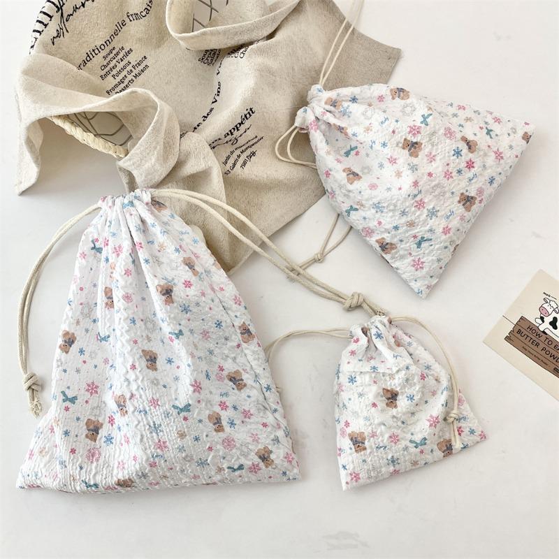 53314 [Copyright] Embossed cartoon bundle mouth bag dustproof portable finishing cloth bag drawstring cosmetic storage