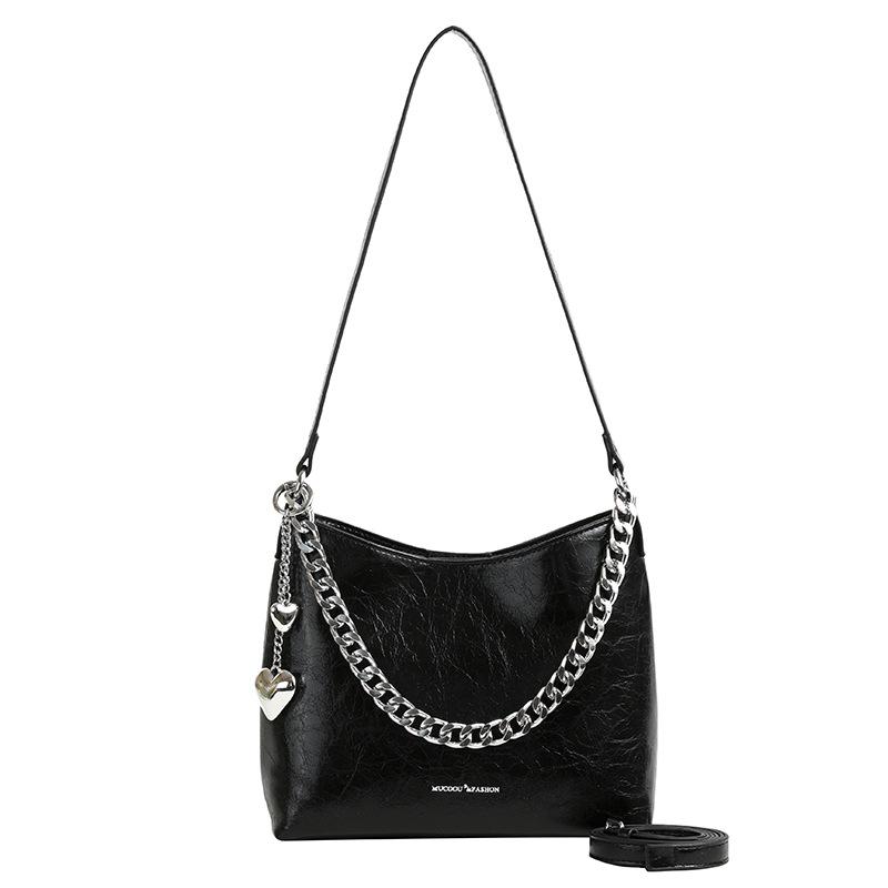 

Новая стильная сумка с нишевым дизайном, которая выглядит как высококачественная сумка на одно плечо и через плечо, известная в Интернете и популярная