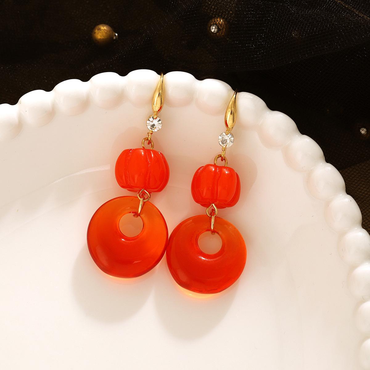 

Винтажные оранжевые геометрические серьги на лето: Уникальные эффектные серьги с изысканным шармом оранжевый