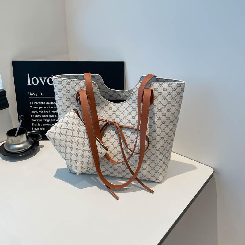 

One-shoulder portable tote bag, new trendy large-capacity commuting fashion printed underarm bow women s bag белый