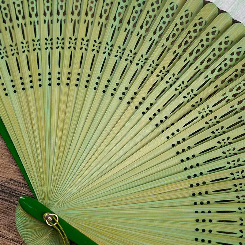 New Chinese-Style Traditional Folding Fan for Dance, Hanfu, and Cheongsam, with Hollowed-Out Craftsmanship and Small Fan Bones
