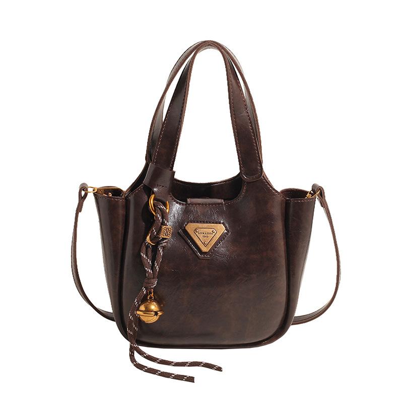 Autumn and winter retro portable tote bag women's 2025 new bag high-end sense versatile niche design shoulder messenger bag