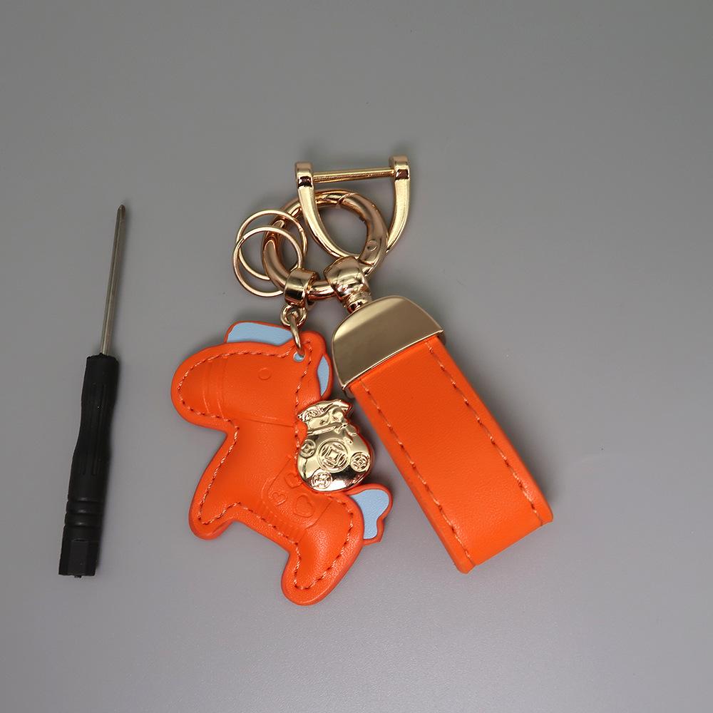 Instant Wealth Leather Keychain with Cartoon Pony Pendant for Couples – Trendy Bag and Car Accessory