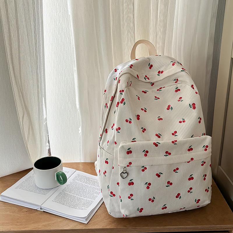 School bag female ins Japanese girls college wind small floral backpack Korean version Harajuku printed middle school student backpack female