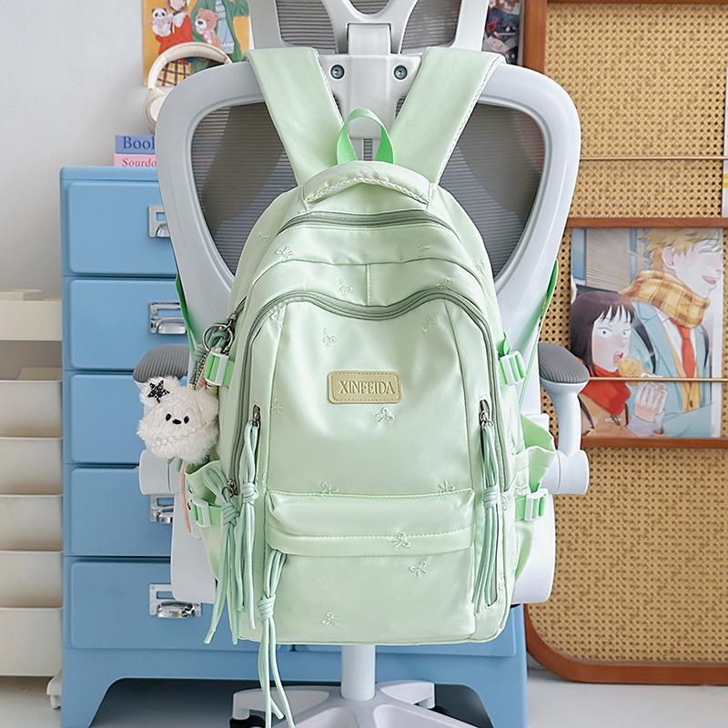 Schoolbag custom cute bow backpack student tutoring bag lightweight 1-1 grade three-piece backpack burden reduction
