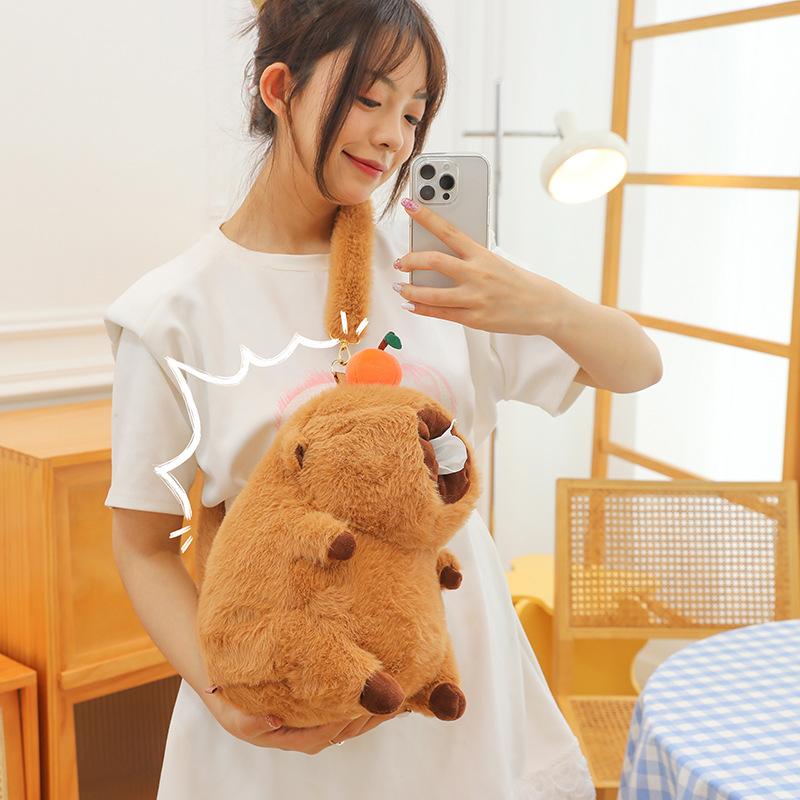 New head orange capybara bag paper drawn plush toy ugly doll kapibara double shoulder doll backpack