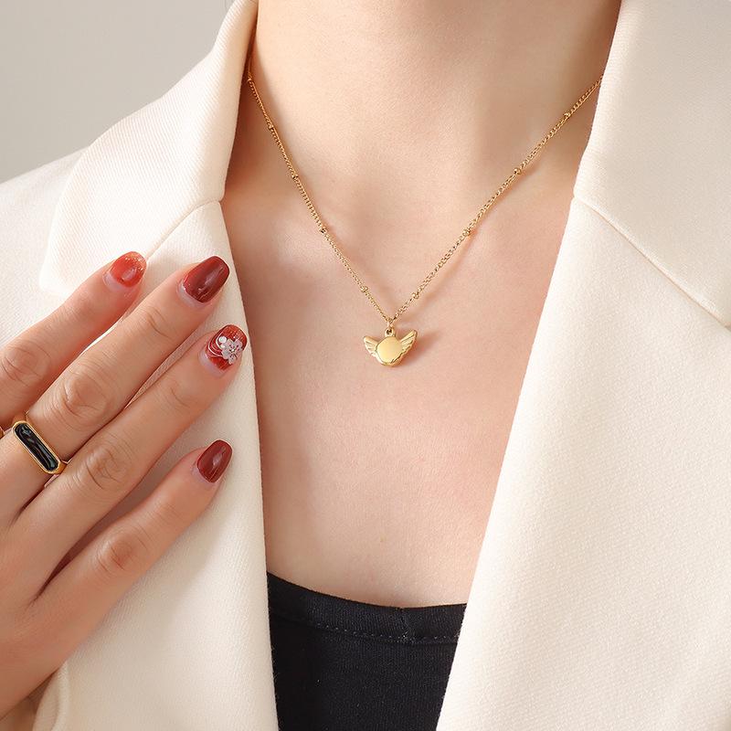 Gold-Plated Geometric Wing Pendant Necklace: Japanese-Korean Design with Titanium Steel Clavicle Chain
