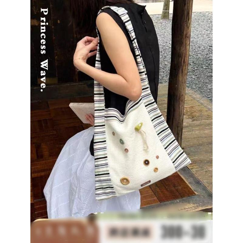 

Note Ce Heat Wave Princess summer splicing shoulder large capacity tote bag niche commuter messenger bag 89