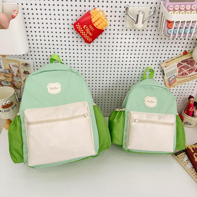 

2024 new backpack small, medium and large class backpack cute children s simple color matching schoolbag