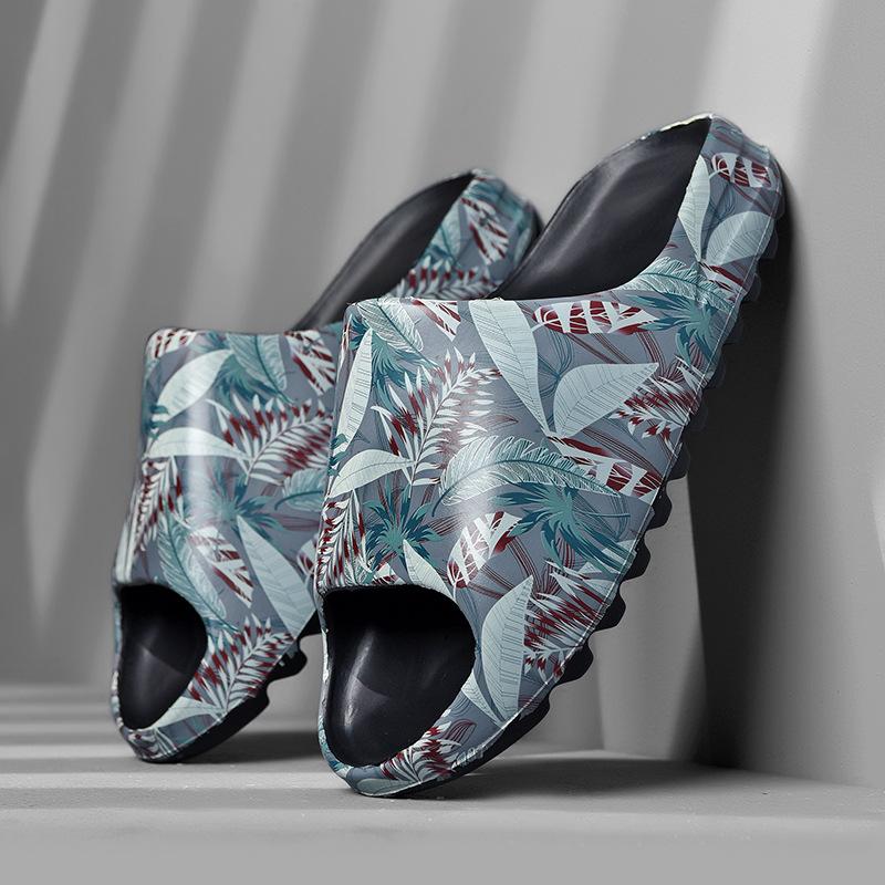 

Летние новые тапочки мужские Kanye кокосовые рыбные туфли повседневные тапочки на одно слово большого размера цельные 2025 33