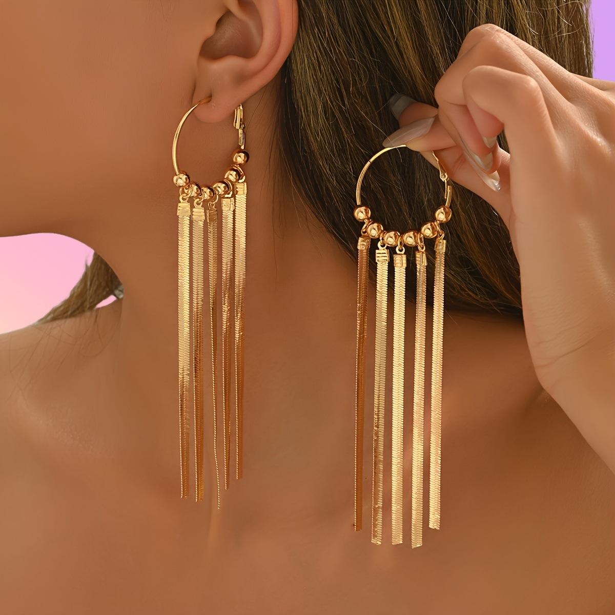 

Модные серьги-подвески для женщин золотой