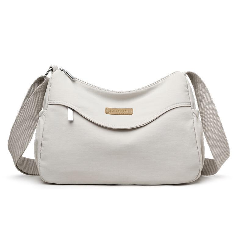 

Уличный тренд, одноплечевая, большой вместимости, повседневная и легкая женская сумка бежевый