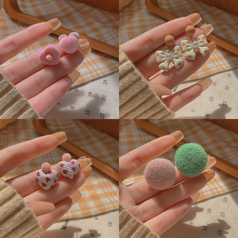 Silver needle autumn and winter hairball earrings women's high-end sense retro temperament earrings Korean niche ear jewelry