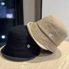 Autumn and Winter Hats for Women Fashionable Metal Label Fisherman Hat Street Casual Versatile Face Showing Small Elegant Curling Edge