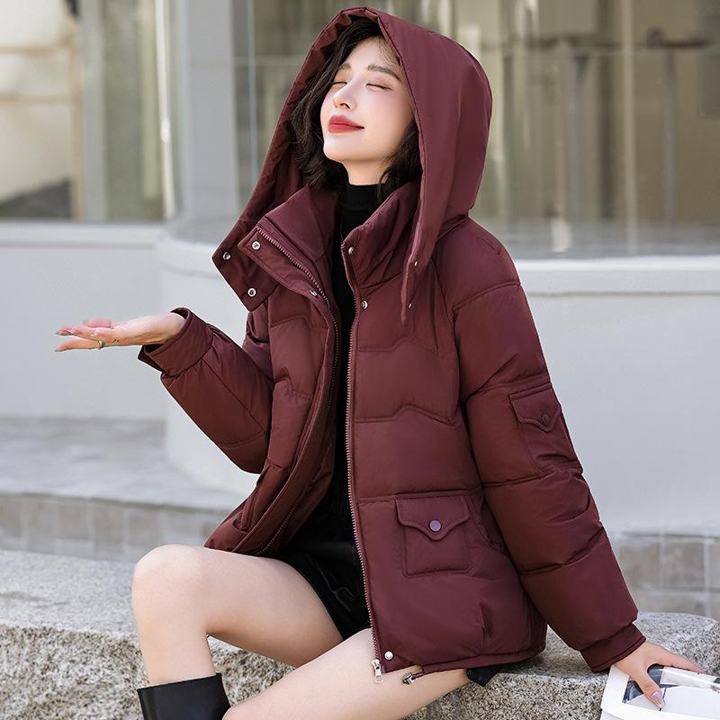 

Женская короткая ветрозащитная теплая зимняя куртка с капюшоном и регулируемым подолом XXXL красный