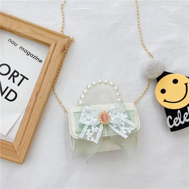Stylish Children's Pearl Handbag With Bow Design Perfect For Mini Fashionistas And Daily Outings