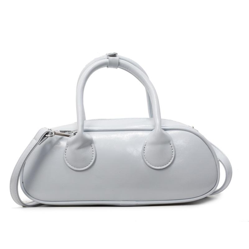 New niche high-end sense simple solid color personality versatile fashion portable messenger women's bag