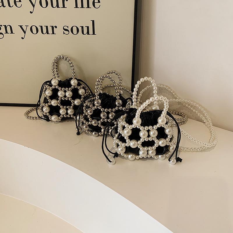 Summer small bag 2025 new small fragrant wind pearl shoulder ins women's shoulder crossbody hollow woven bag tide