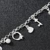 Pulsera de plata europea y americana, pulsera con trece colgantes, joyería de múltiples elementos para mujer, pulsera de estilo simple al por mayor