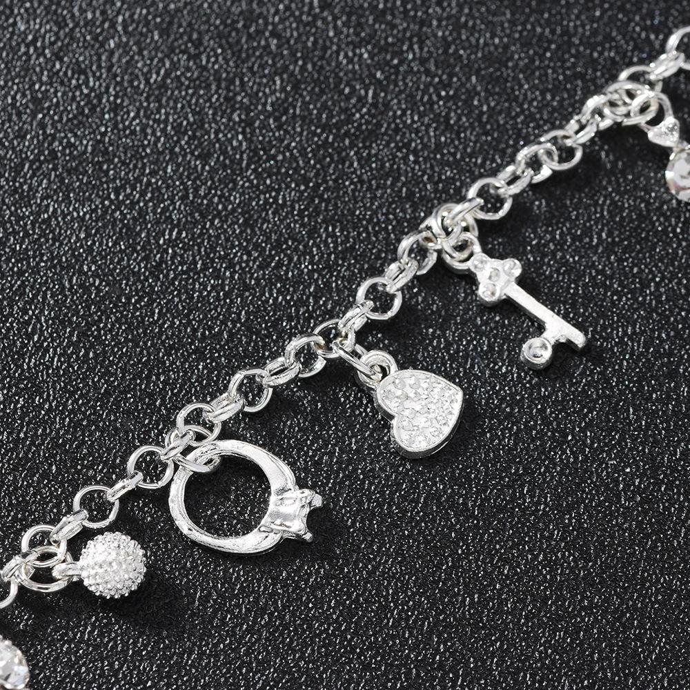 Pulsera de plata europea y americana, pulsera con trece colgantes, joyería de múltiples elementos para mujer, pulsera de estilo simple al por mayor