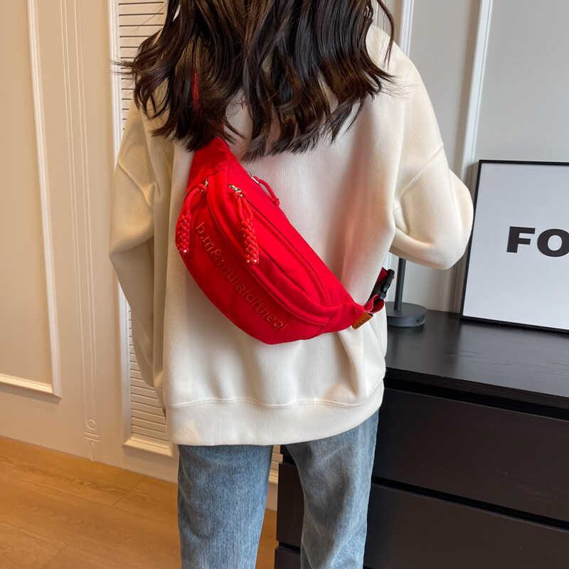 Versatile Water-resistant Canvas Crossbody Bag With Letter Print Perfect For Travel And Casual Use