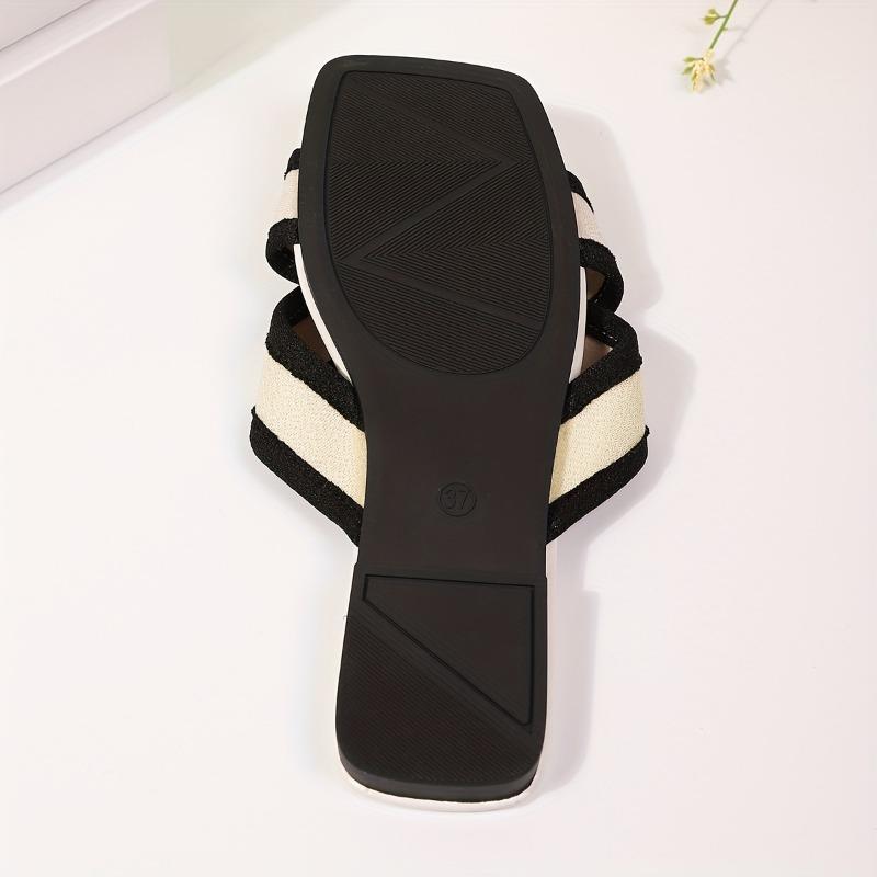 Stylish Black and White Strappy Flat Sandals - Elegant Open-Toe Design with Adjustable Straps, Perfect for Summer and Beach Wear