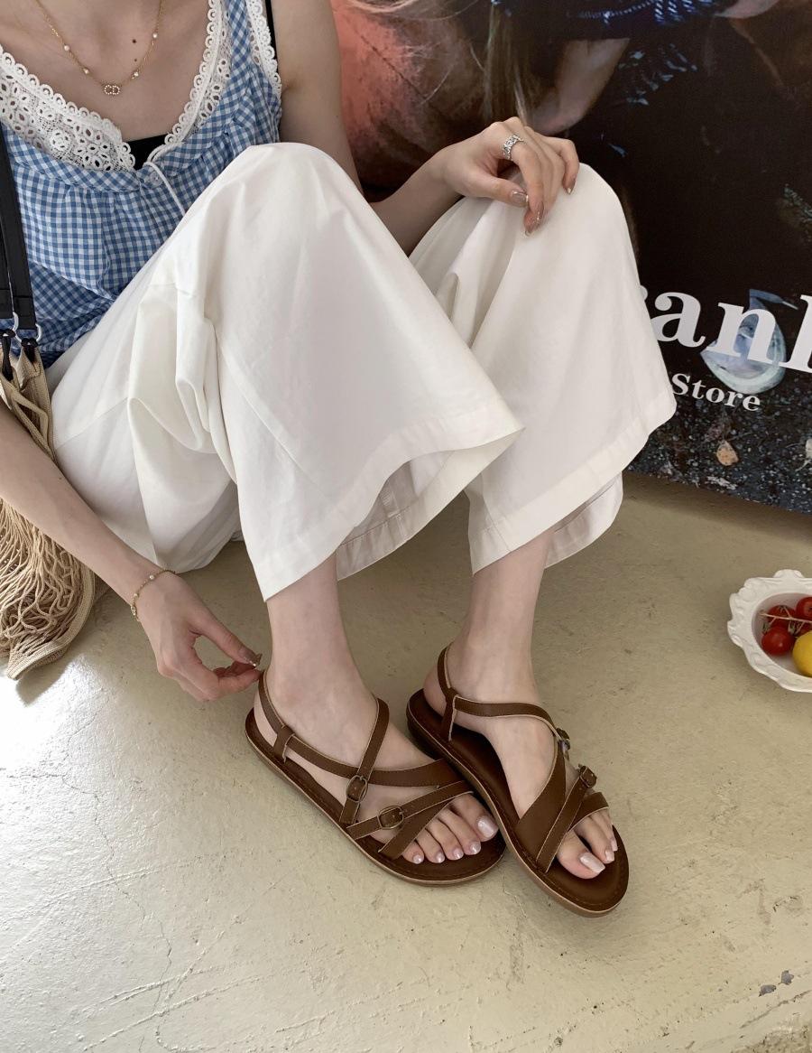 

Round head sandals women s summer 2025 new retro cross buckle with niche design Roman shoes flat bottom 39 коричневый