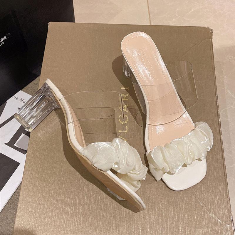 

Прозрачные босоножки на высоком каблуке летние хрустальные сандалии на толстом каблуке женские 2025 новые фея ветер полушлепки французские интернет-знаменитости крутые тапочки 40