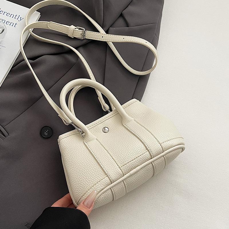 Korean Niche Dopamine Lychee Pattern Portable Bucket Bag Casual Simple Versatile Temperament Commuter Messenger Women's Bag
