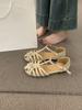 Retro woven hollow bag head sandals women's summer 2025 new one-word buckle bag heel flat Roman shoes