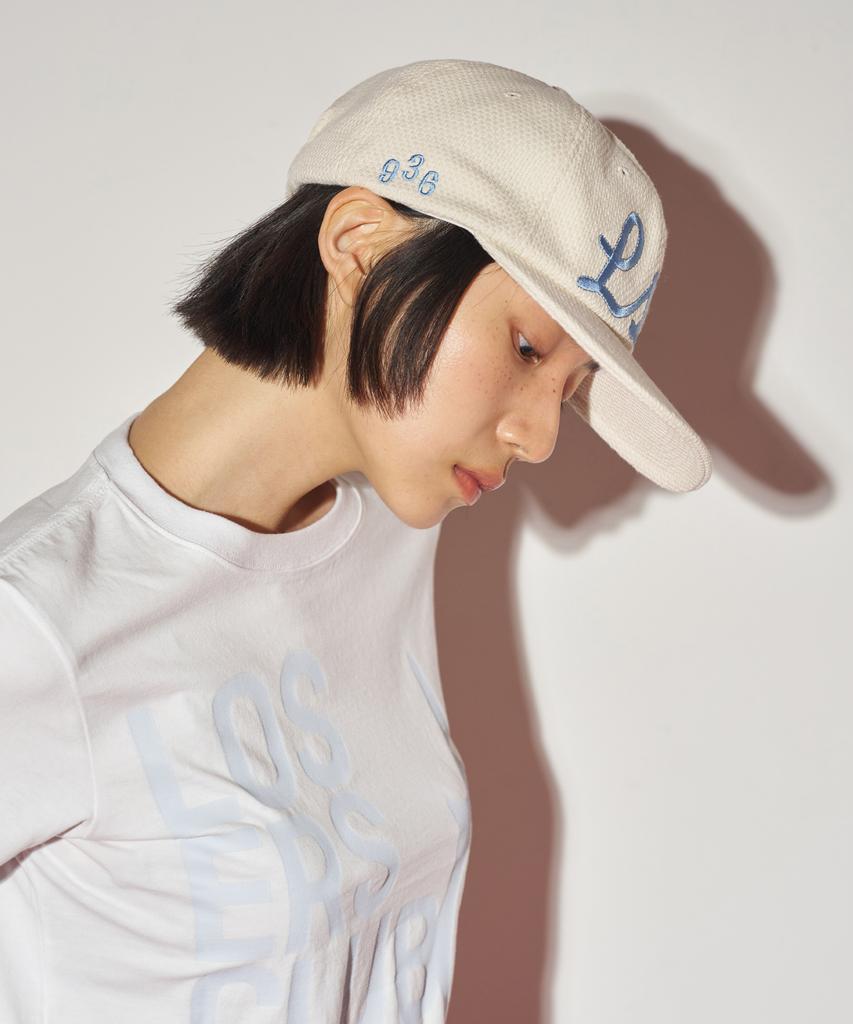 Lujeoseukeulleob Star Logo Cap Ivory