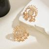 European and American Jewelry Hollow Metal Devil's Eye Earrings Versatile Design Sense Diamond Tassel Star Stud Earrings Women