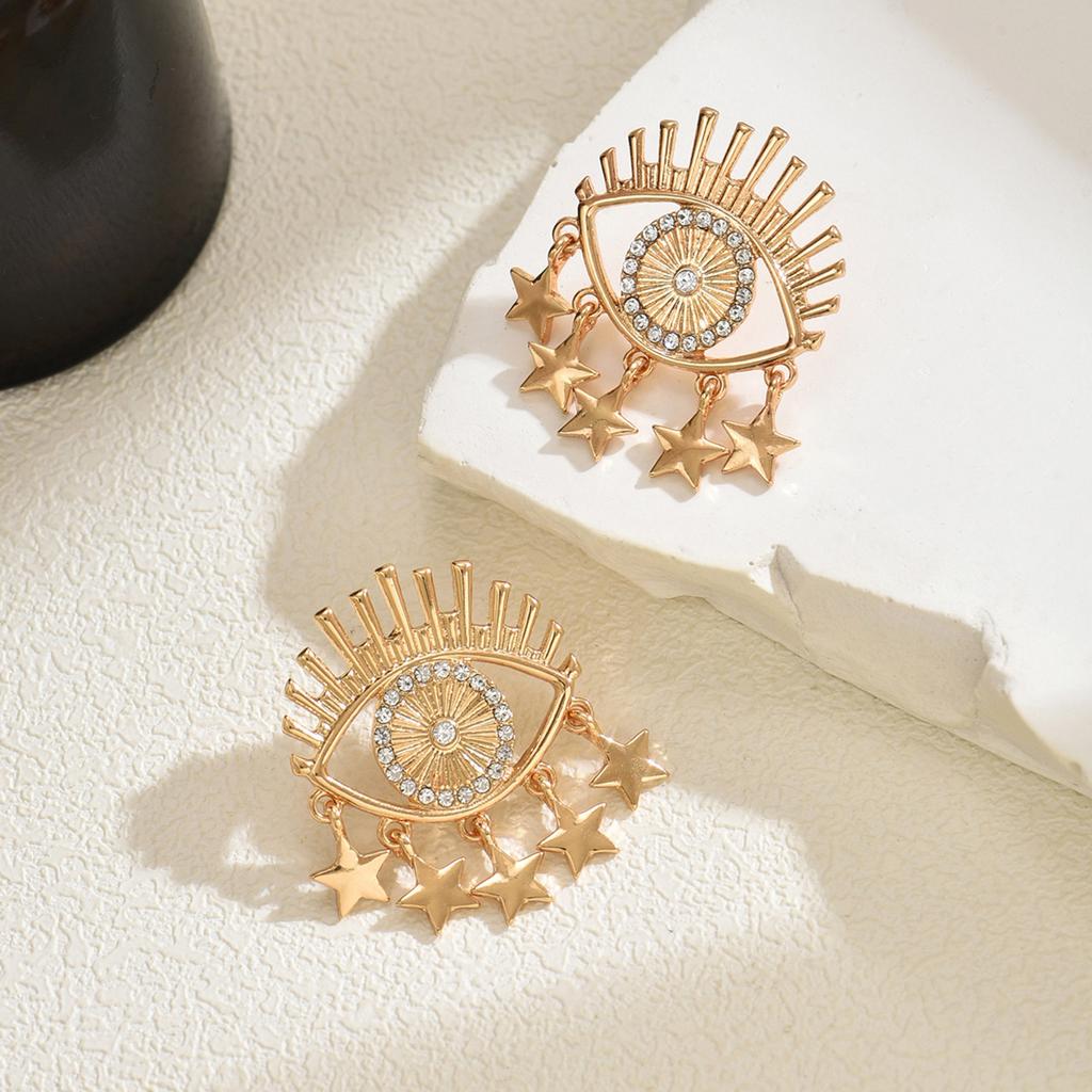 European and American jewelry hollow metal devil's eye earrings versatile design sense diamond tassel star stud earrings women