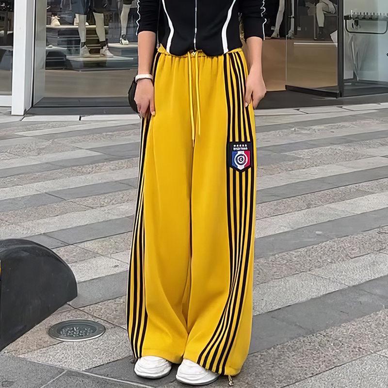 

Американские ретро желтые спортивные штаны с высокой талией и широкими штанинами с дизайном из пяти полос для весны и осени 2025 года S (80-90 jin) жёлтый