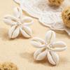 Beach vacation style seashell woven flower earrings suitable for wearing during summer play