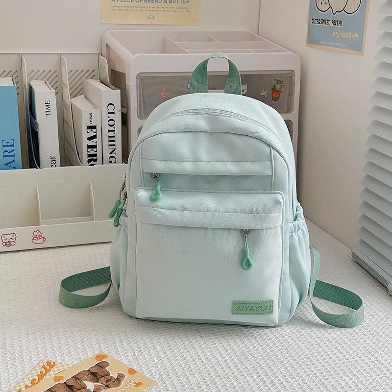 Leisure campus solid color high school student schoolbag new small fresh nylon travel backpack outside