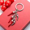 Portachiavi Creativo Metallo Peperone Rosso Mini Ciondolo Peperone Accessori Portachiavi in Lega Set Cuffie Accessorio Auto Portachiavi
