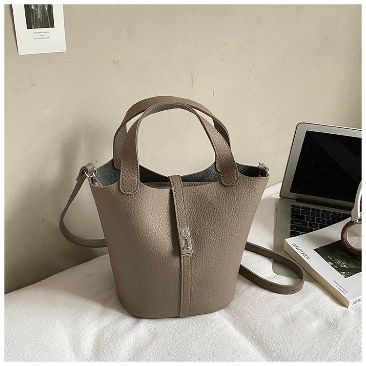 Fashion vegetable basket bucket bag women's 2025 autumn new high-value shoulder bag simple solid color niche messenger bag