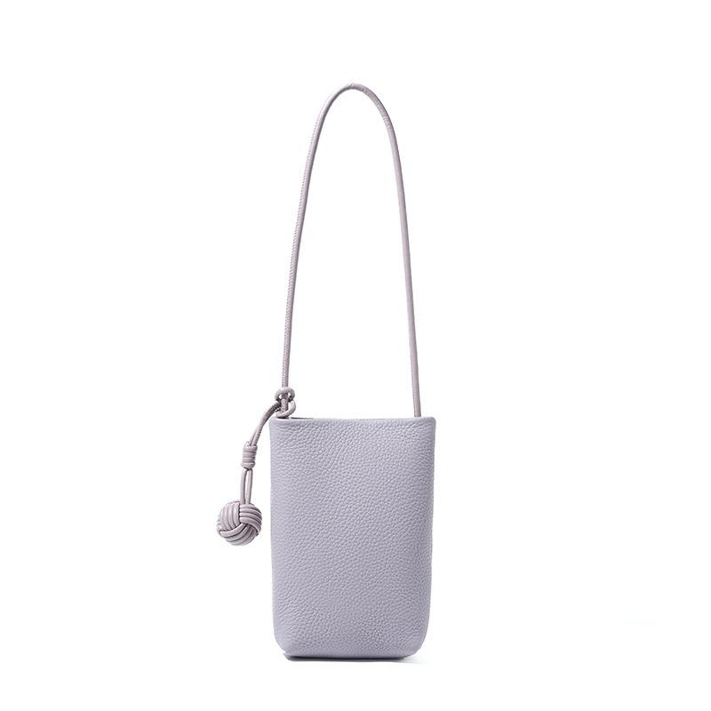 Hot-selling women's bags, high-end commuting versatile messenger bags, change bags, mobile phone bags, small bags, vertical leather mobile phone bags.
