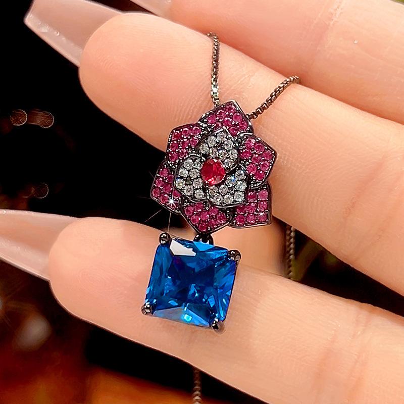 Autumn and winter new Huabi jewelry copper bottom gold-plated simulated blue spinel black gold vintage camellia set 10*10