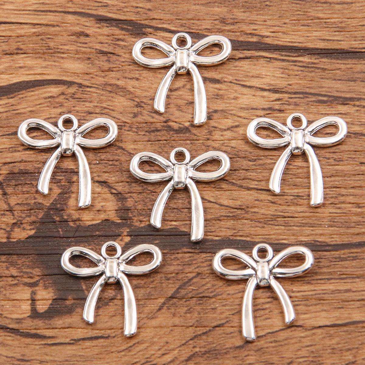 

10pcs DIY Alloy Jewelry Small Accessories Hollow Cute Bow Pendant 18*18mm