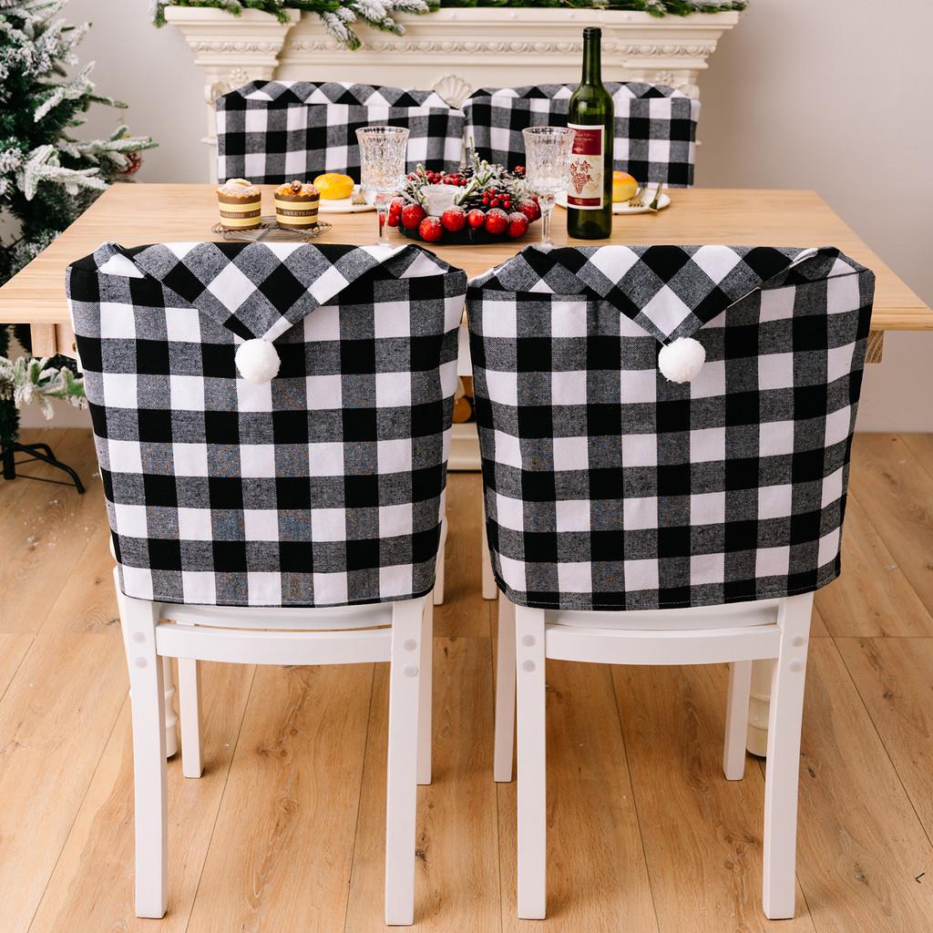 And Cozy Black White Checkered Christmas Chair Slipcover With Stylish Pom Poms For Holiday Atmosphere