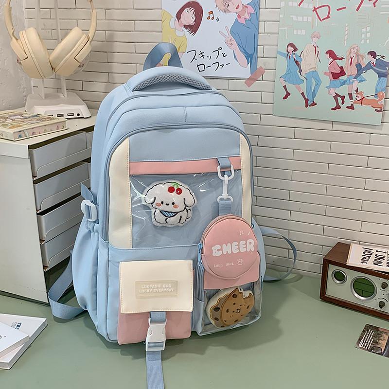 

Fashion Blocked Color Letter Pattern Backpack With Compartment Transparent Blue Dog Biscuits