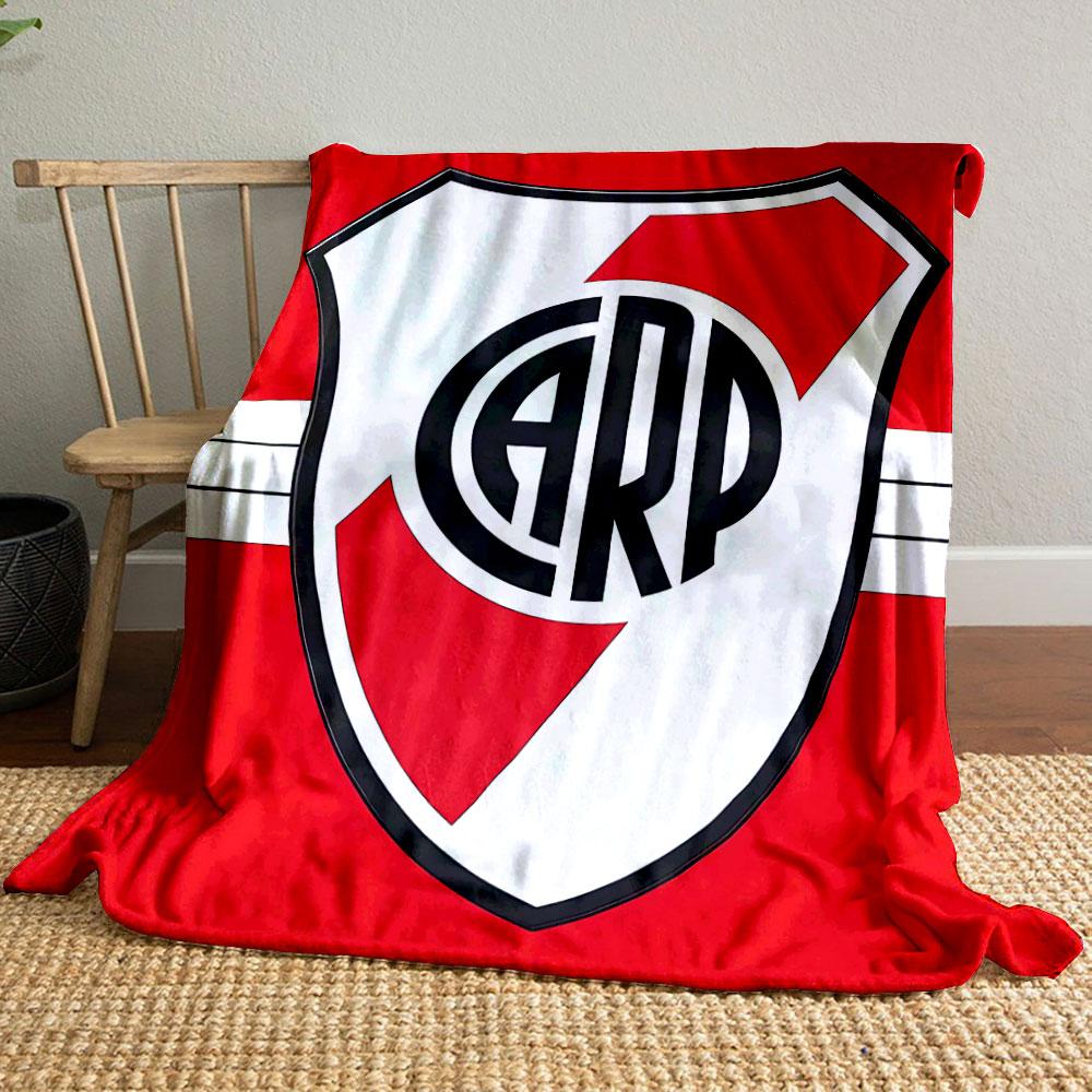 A shield with red diagonal stripes and bold "CARP" letters in the center. for all seasons blanket lunch break throw gift
