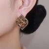 Temperament black rhombus crystal earrings new diamond-encrusted flower stud earrings women's fashion design high-end earrings