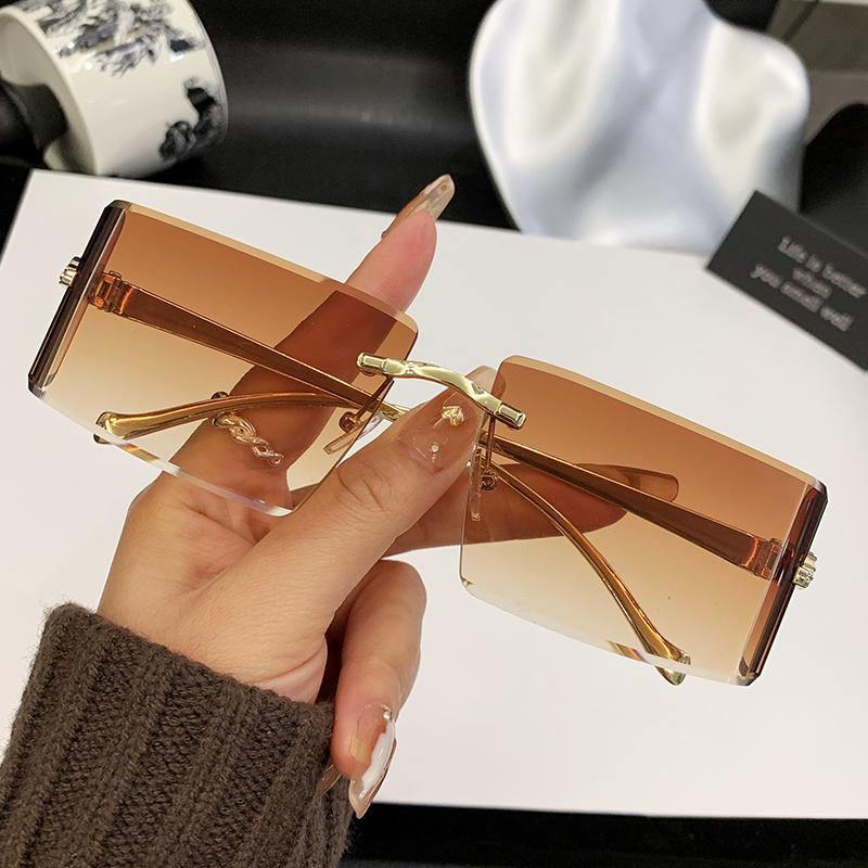 New Curved Lens Leopard Head Metal Frameless Edge Cutting High-Quality Sunglasses 90300